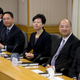 Hong Kong government officials, from right, Undersecretary of the Constitutional and Mainland Affairs Bureau Lau Kong-wah, Secretary for Constitutional and Mainland Affairs Raymond Tam, Chief Secretary for Administration Carrie Lam, Secretary for Justice Rimsky Yuen and Office of the Chief Executive director Edward Yau Tang-wah attend a photo call before their talks on constitutional development with the student leaders in Hong Kong Tuesday, Oct. 21, 2014. Hong Kong's Beijing-backed leader says his government won't let the public nominate candidates to succeed him, as thousands of protesters demand, but there's room to discuss how to form a key committee that would pick candidates.
